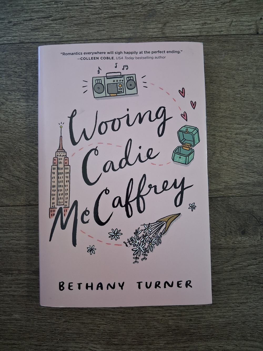 Wooing Cadie McCaffrey – Pink Paperback Book